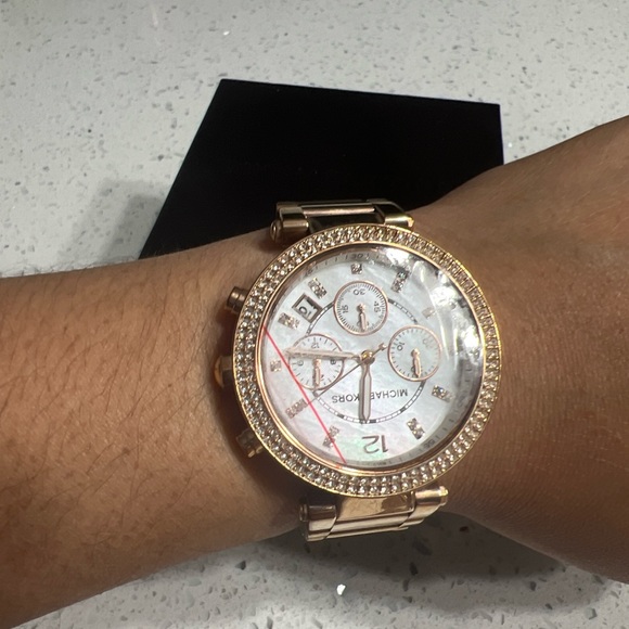 Michael k watch  Mint condition , gently worn has extra links for size adjust. - Picture 3 of 3